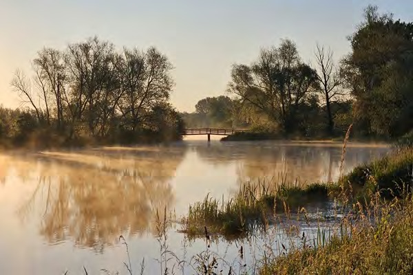 Zonsopkomst boven het water in stiltegebied Asbroekerheide